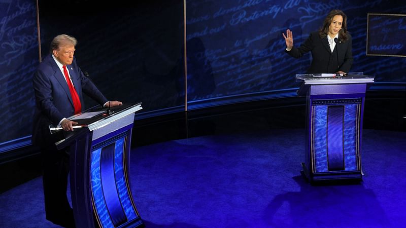 Democratic presidential nominee, US Vice President Kamala Harris speaks during a presidential debate hosted by ABC as Republican presidential nominee, former US President Donald Trump listens, in Philadelphia, Pennsylvania, US, on 10 September 2024